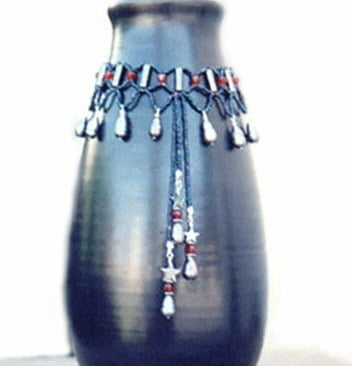 tall handmade matte black ceramic vase with beaded collar pearls and garnet