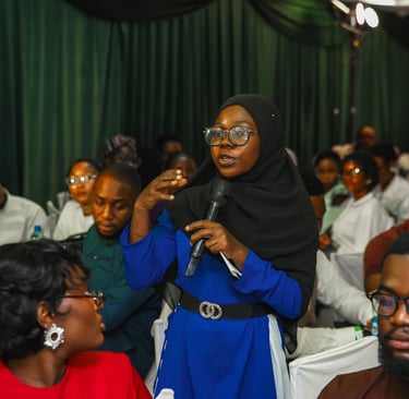 Participant asking questions to the panelists
