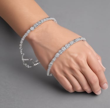 A pair of delicate sapphire earrings sparkling against a dark silk background.