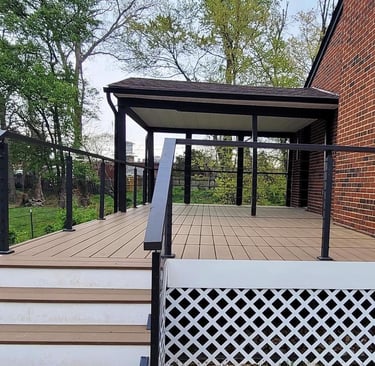 New deck replacement with composite decking and metal railing in Northern Virginia by The Great Hous