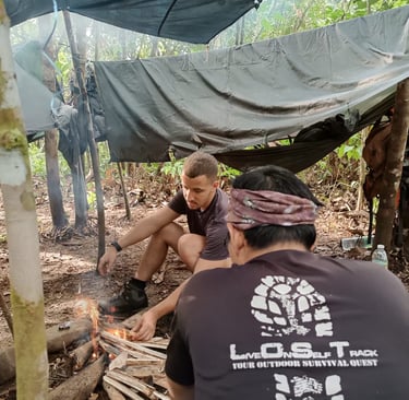  Guide and traveler sitting around a campfire