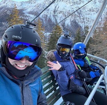 family on a chair lift in la thuile