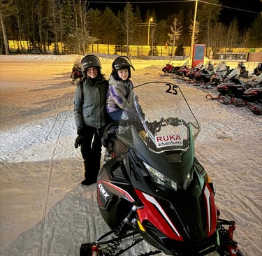 Family snow mobility in Ruka Finland 