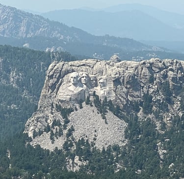 mount rushmore view from helicopter