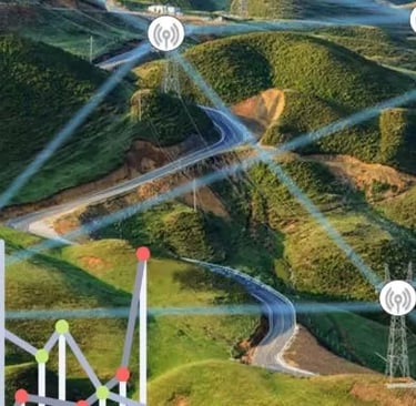 Digital data network and wireless communication towers across a rural green mountain landscape.