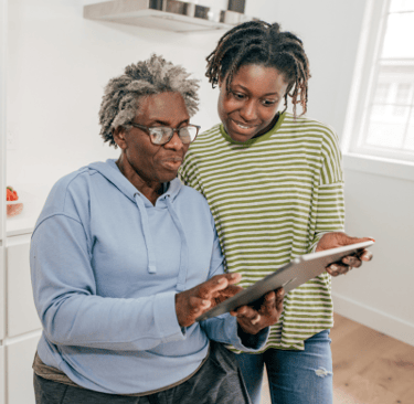 Elderly woman using iPhone, iPad, Apple text-to-speech , ocr assistive device features