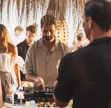 Professional DJ performing an Afro-house set at the SOLÉ booth in Trocadero Zanzibar