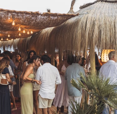 Sophisticated crowd enjoying the golden hour at SOLÉ, Trocadero Zanzibar