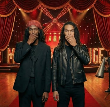 Performer on stage covering their mouth, suggesting silence during a pop performance.