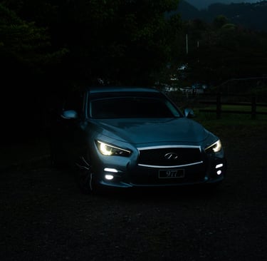 blueish-grey infinity q50 in the night