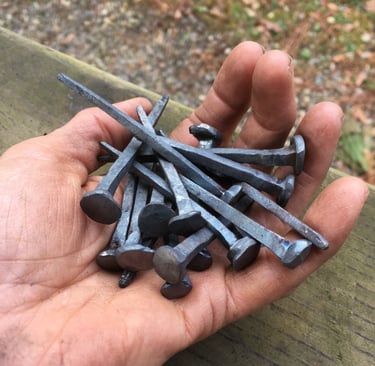 Handful of nails forged by Brenda Posey