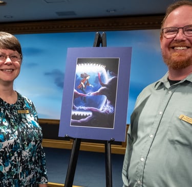 Brenda Posey with illustrator Roddy Taylor at the art reveal of "Canary"