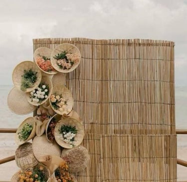 a wooden fence with a bunch of flowers on it