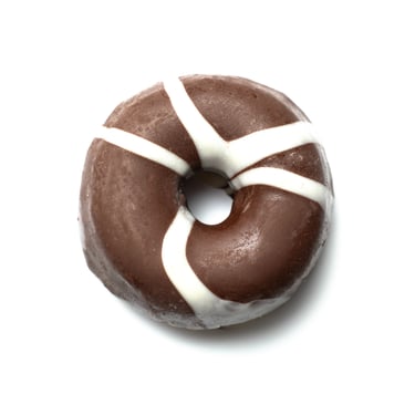 a chocolate covered donut with white icing and chocolate icing