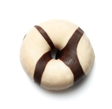 a chocolate covered donut with chocolate icing