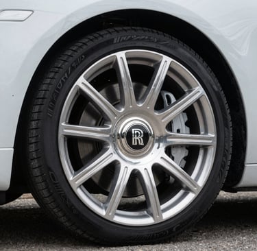 Close-up of a freshly polished car hood reflecting the bright sun, highlighting a flawless gloss.