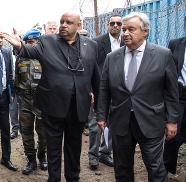 Former senior UN official Bruno Donat with UN Secretary-General in Munigi, DR Congo, circa 2019