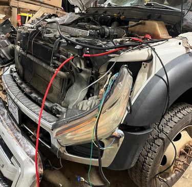 Truck taken apart for a plow installation