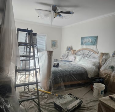 a bedroom with a ladder and a ladder