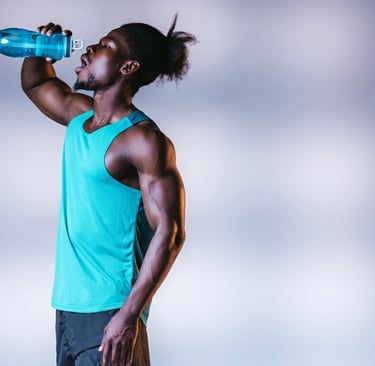 Muscular man drinking shilajit