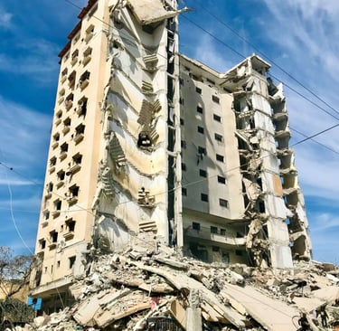 Destroyed multi-story apartment building with heavy structural damage because of earthquake