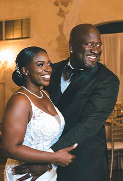 Louisiana wedding couple standing in front of a table