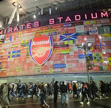 Fans leaving Arsenal's Emirates Stadium.