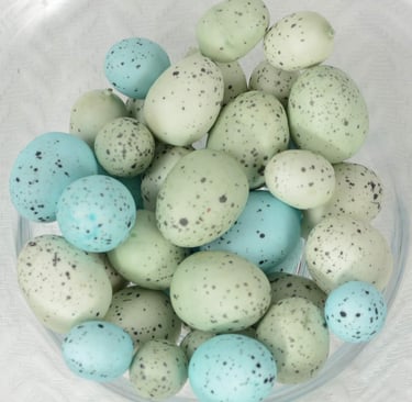Faux speckled eggs in blue and green