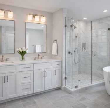 Modern master bathroom featuring a double vanity, marble walk-in shower, and freestanding soaking tub.