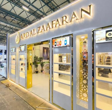 an elegant bespoke cosmetic sector exhibition stand with golden details stand 