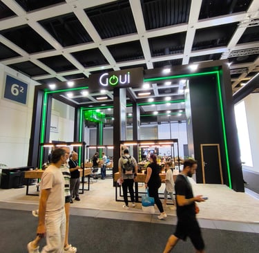 Modern high-tech pavilion featuring vibrant green LED accents and spacious interactive zones.