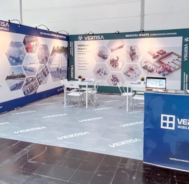 Premium corporate fabric wall exhibition booth for Vertisa Mobile Hospitals at Medica Düsseldorf trade fair.