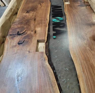 Close-up of premium Black Walnut grain on a handcrafted live edge conference table