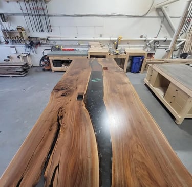 Handcrafted Canadian Black Walnut boardroom table with custom steel legs
