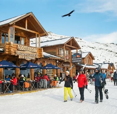 a group of people standing in front of a building in cerro catedral bariloche