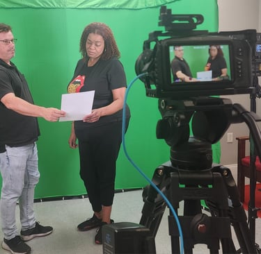 Hands-on filmmaking activity during a Fear Fame Arts Foundation workshop.