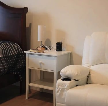 Comfortable bed in adult family home bedroom with clean linens and pillows for resident comfort.