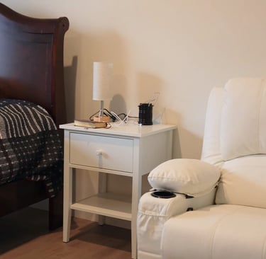 Comfortable bed in adult family home bedroom with clean linens and pillows for resident comfort.