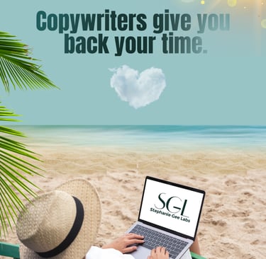 Lady sitting on beach with laptop that has SG Labs on the screen. 