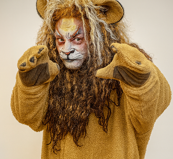 Patrick Carswell as the Lion from Wizard of Oz