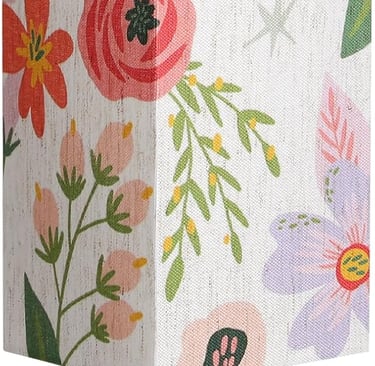 Modern square table lamp with a colorful floral fabric shade on a sleek black metal base.