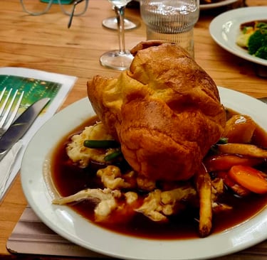 Image showing a Sunday roast dinner with large Yorkshire pudding.