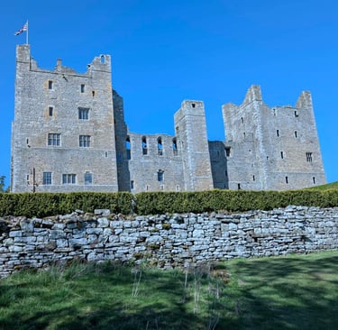 Bolton castle standing high on the hillside with great views of the hills and valleys
