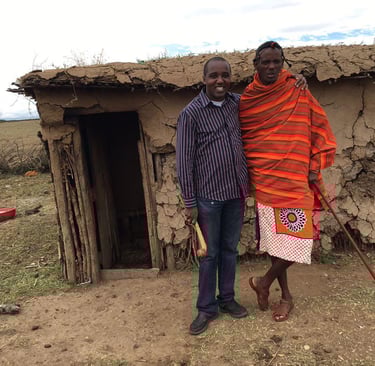 tim and Kasau in the village