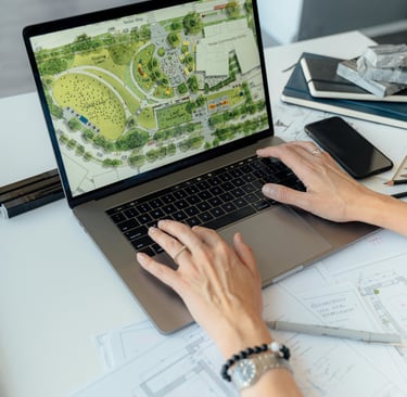 Landscape design and planning on laptop – Yie Yang Landscape