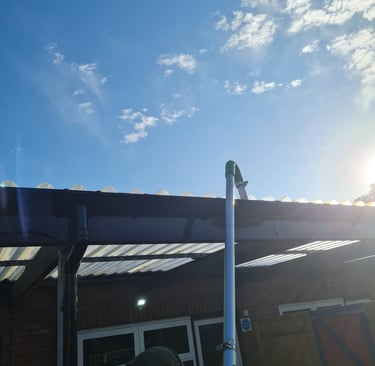 Gutter cleaning with pole and vac