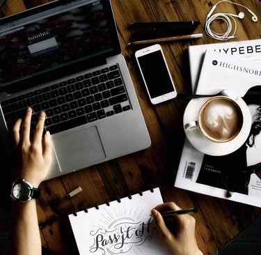 A person is working on the laptop