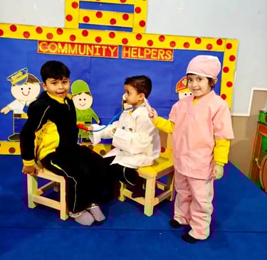 Child playing in essential services evnet of Enfant preschool in Happy heart ,brilliant mind 