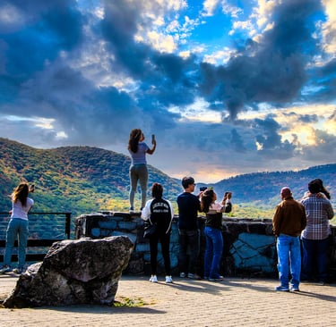 Photo of tourists at scenic overlook