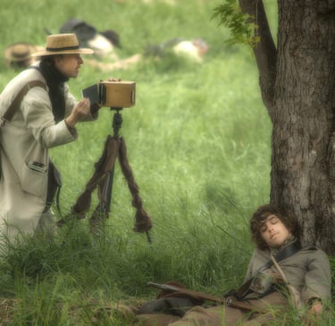 Photo of reenactor as a civil war photographer